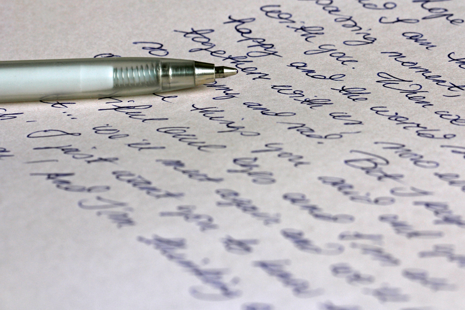 handwritten letter with pen.jpg